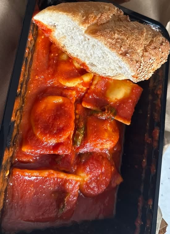Lobster Ravioli with Fresh Tomato Sauce.